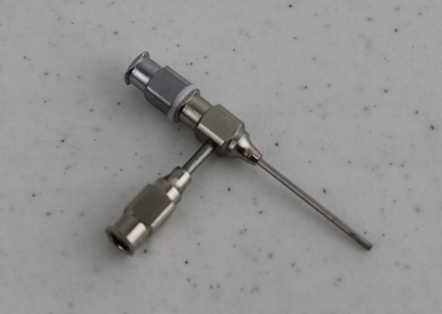 Prebuilt spinneret assembly for coaxial needle and related spinneret applications.